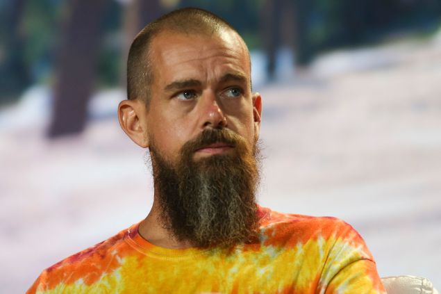 Jack Dorsey in an orange shirt.